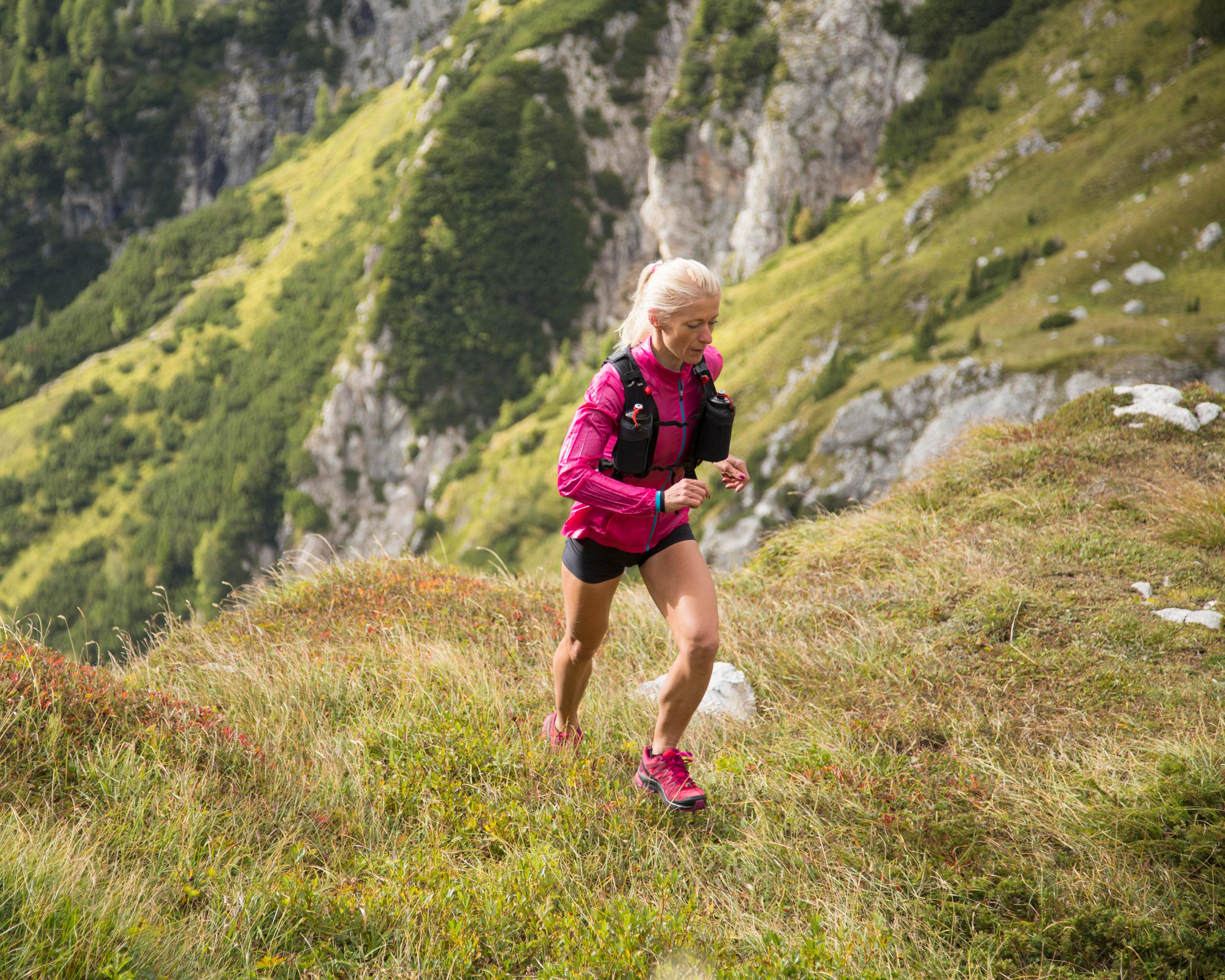 Woman running up hill 638891568.jpeg