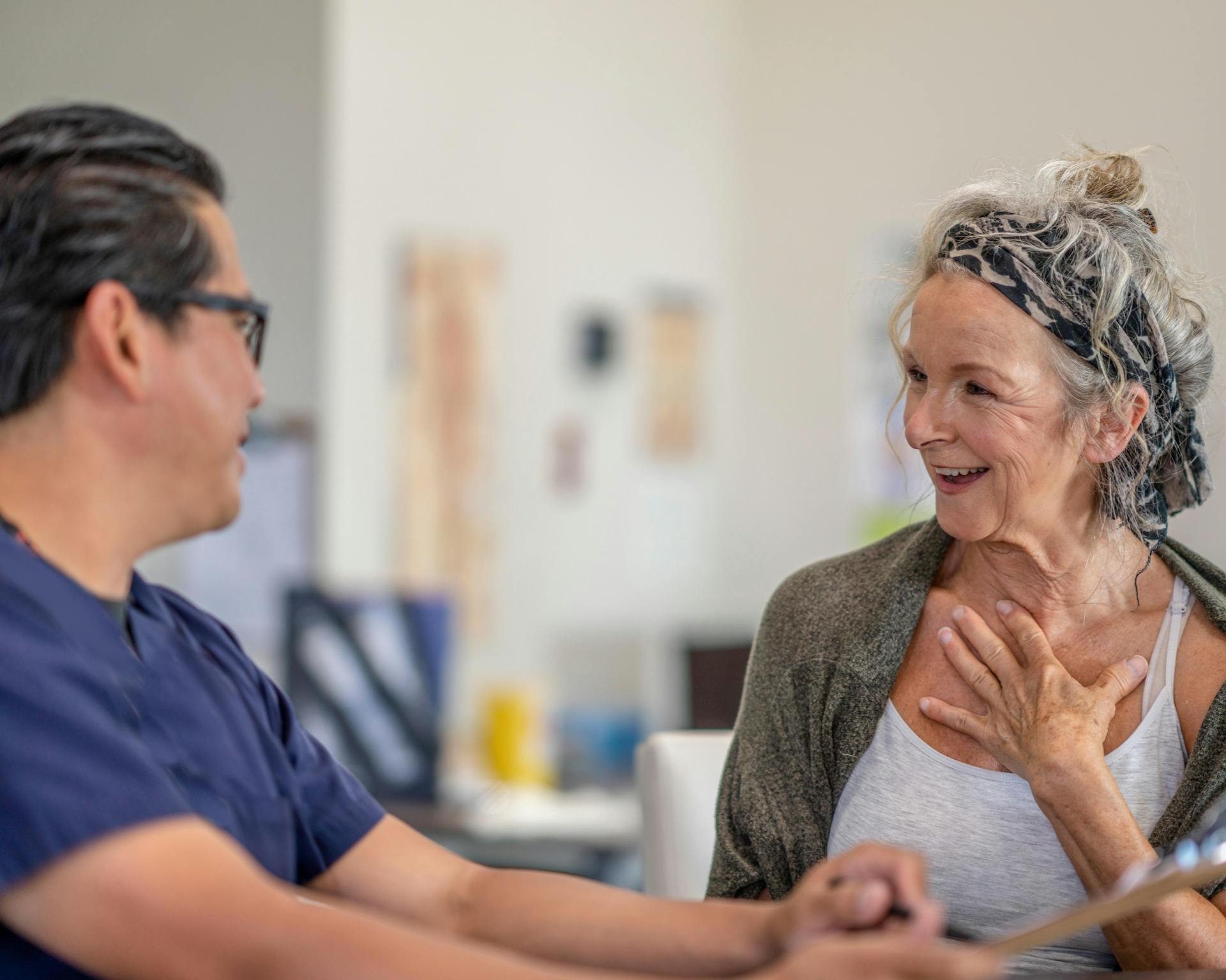 doctor consults with his female patient  1326184328.jpg