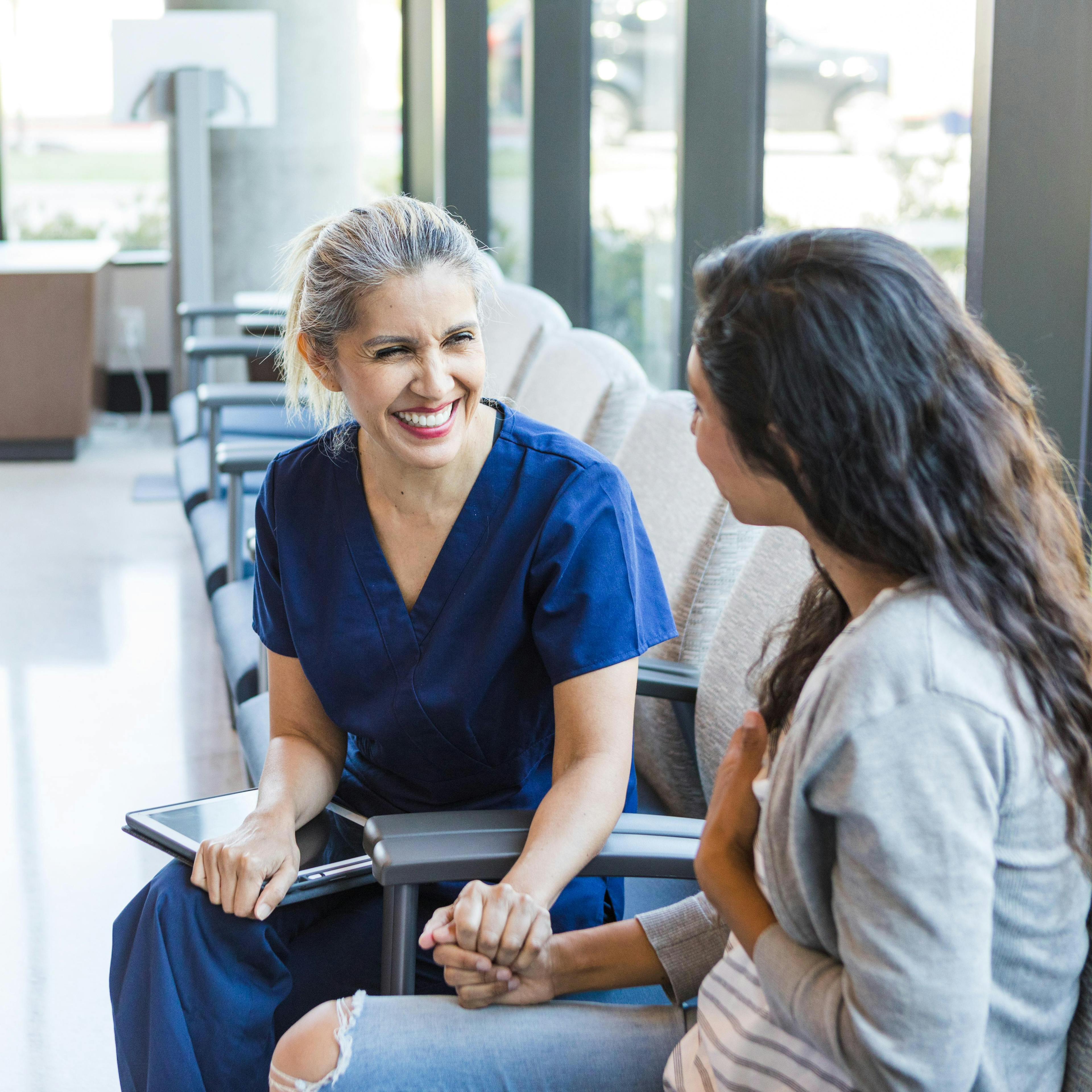 Nurse with patient 1412518760.jpg