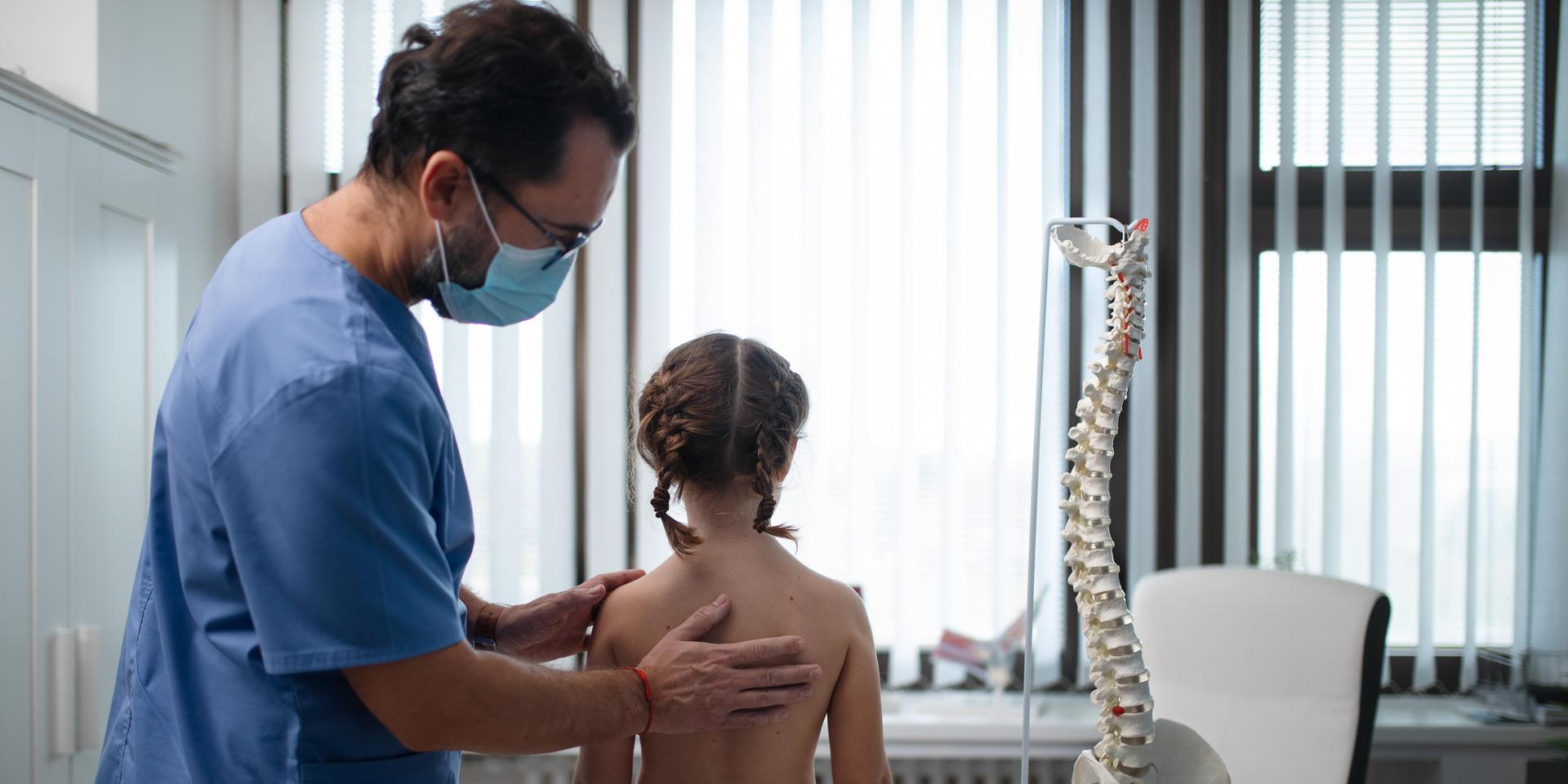 Child's back exam - scoliosis