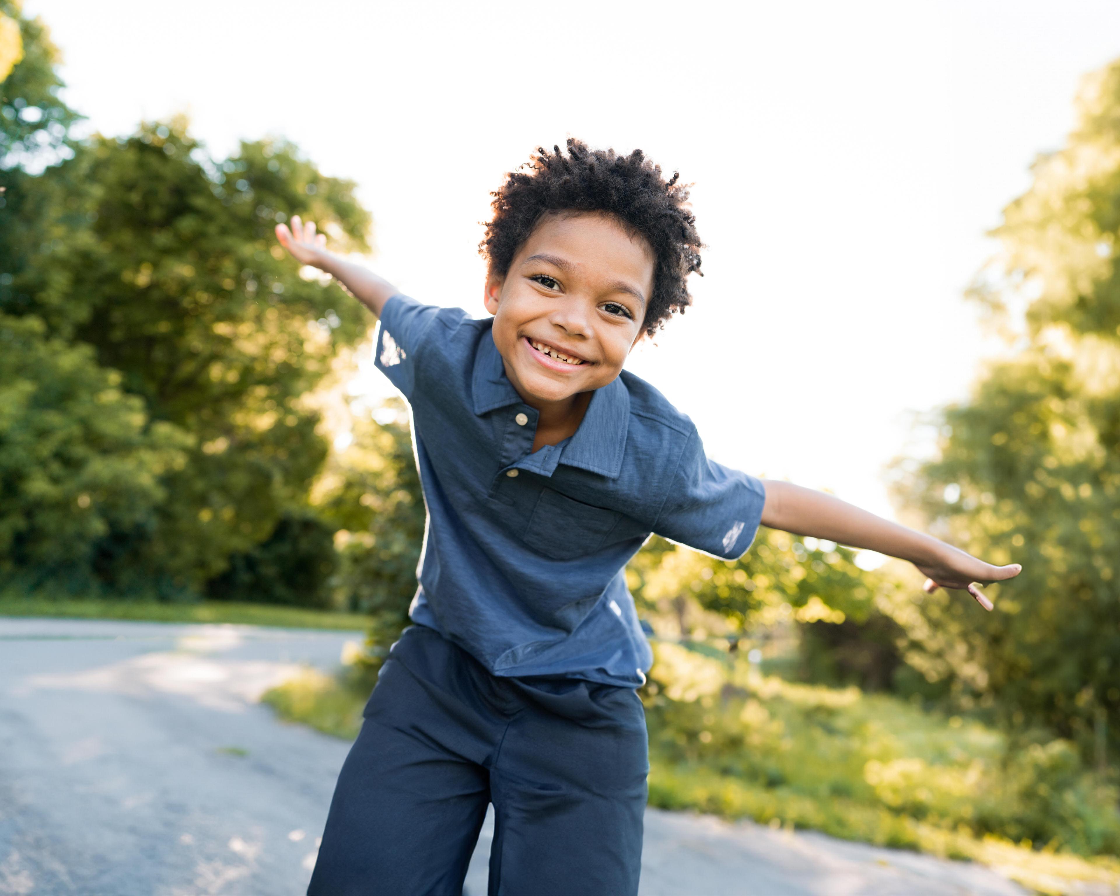 Boy playing aeroplanes