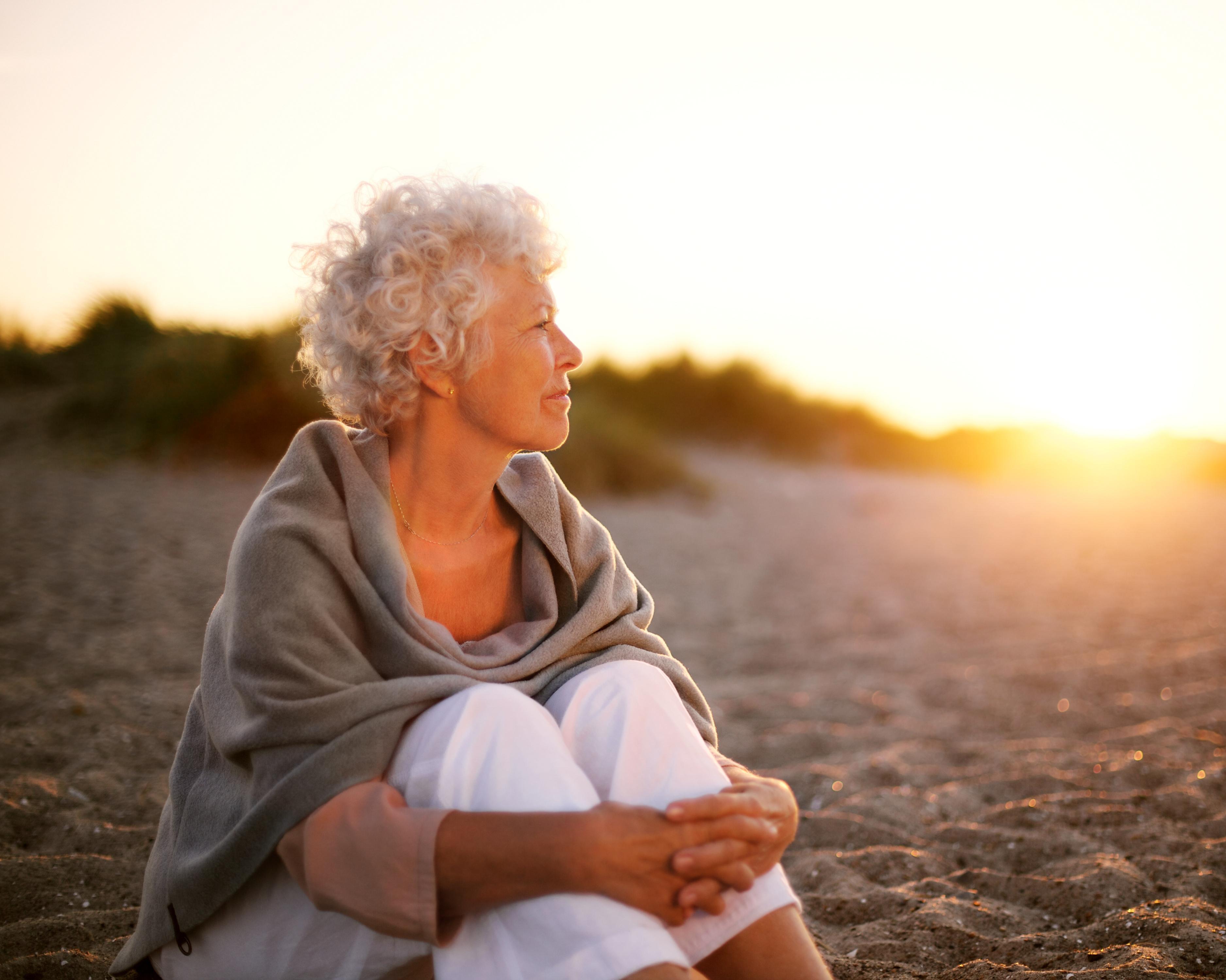 Woman sitting on beach