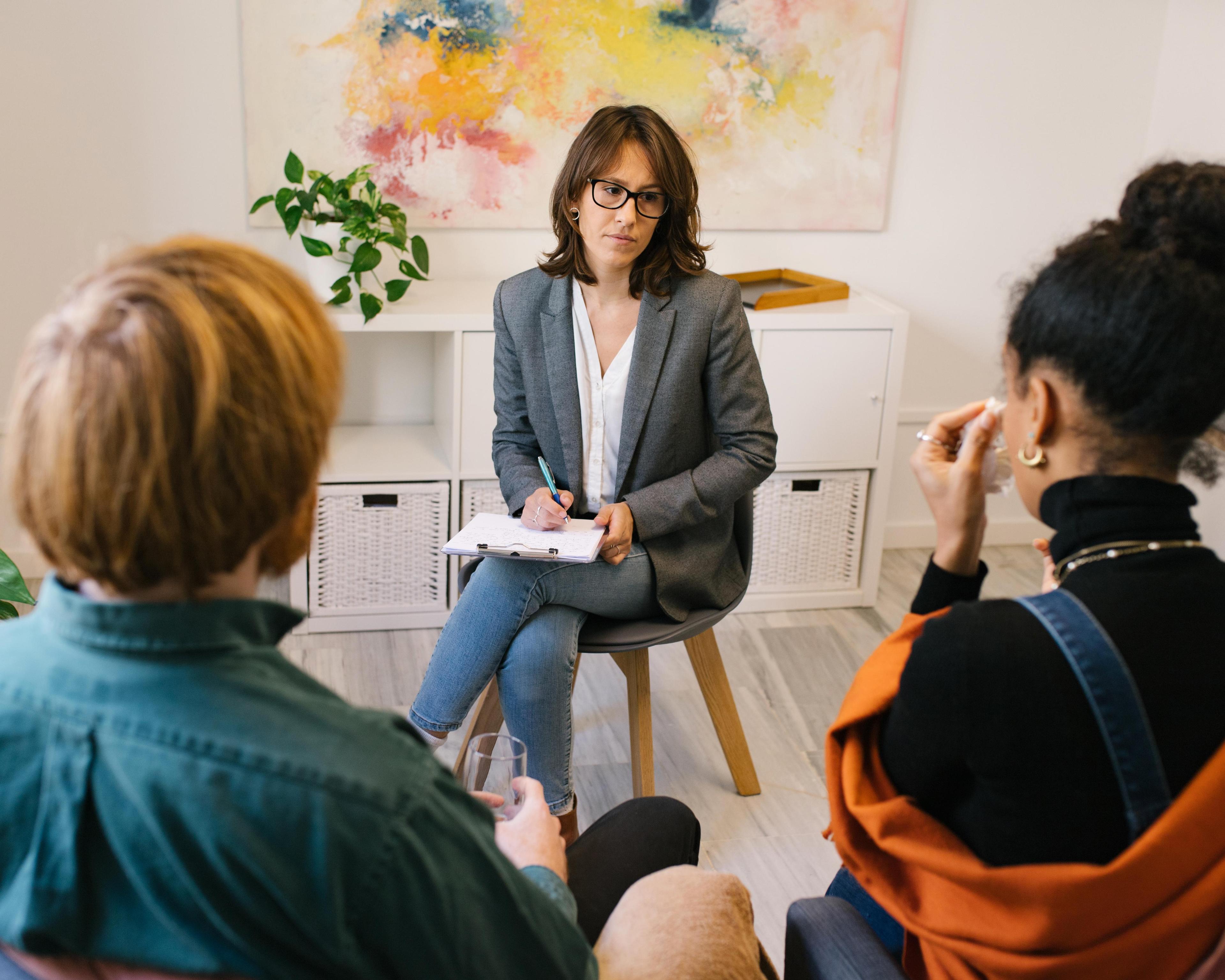 Couple discussing problems with therapist 1488349456.jpg