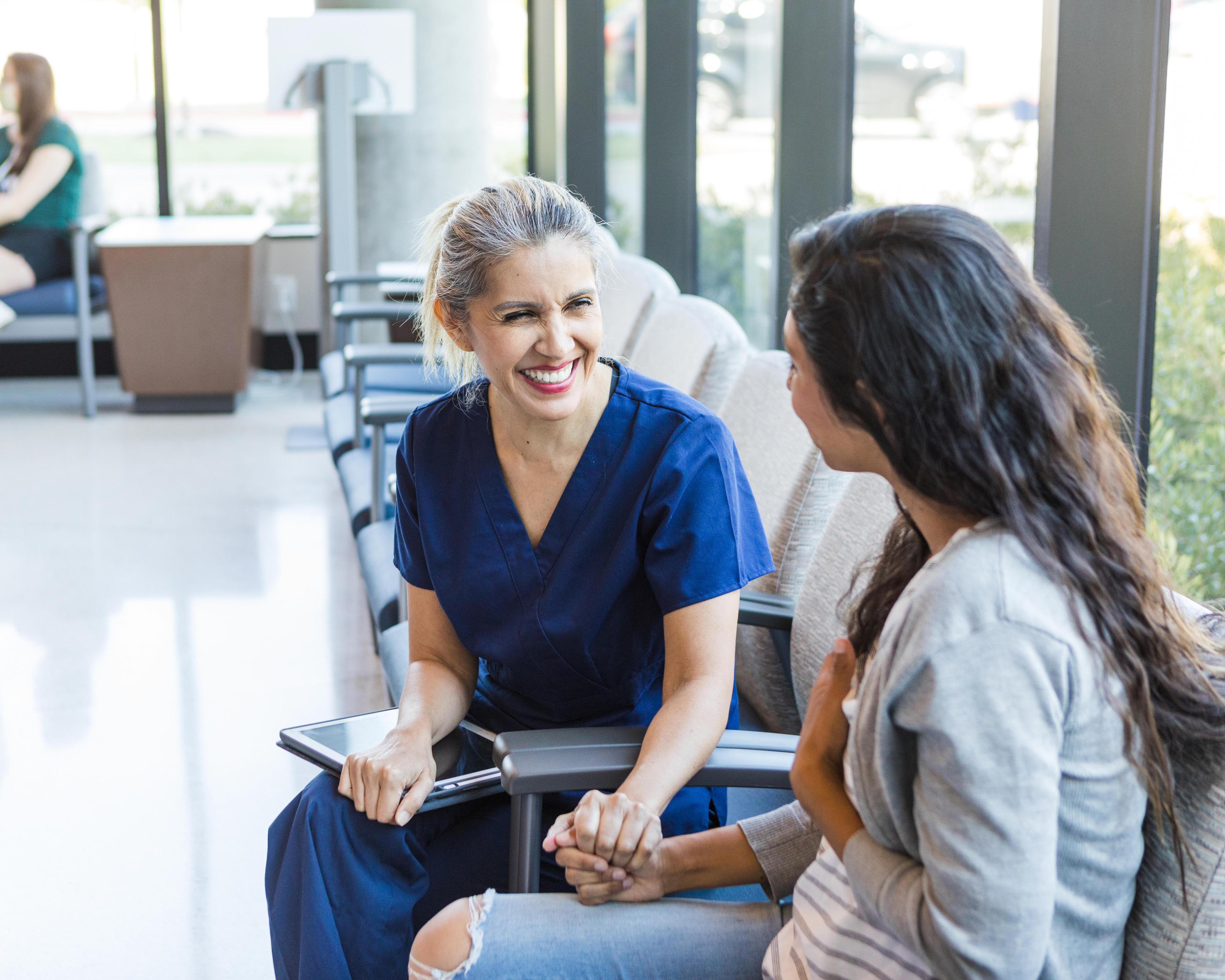 Nurse with patient 1412518760.jpg